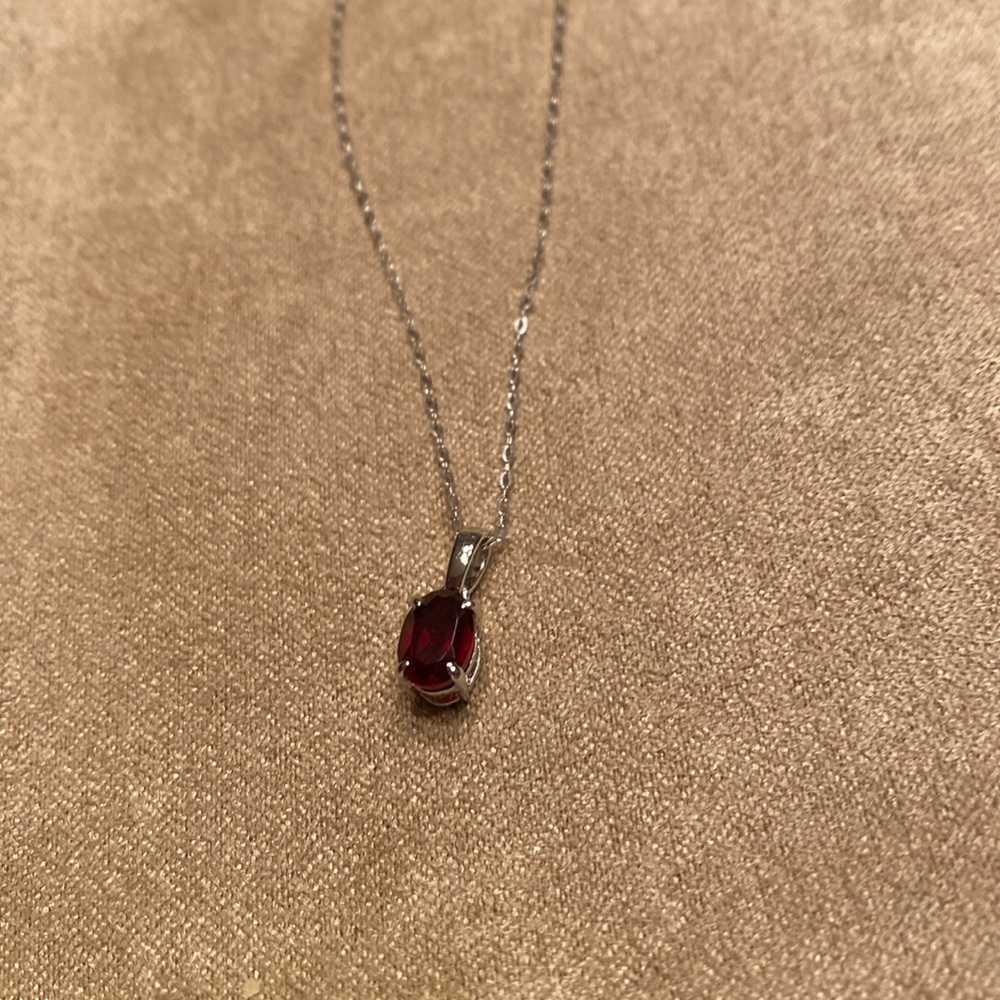 JTV oval garnet rhodium over sterling silver
